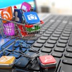Store of laptop software. Apps icons in shopping cart. 3d