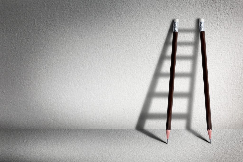 Stairs with pencil for effort and challenge in business to be achievement and successful concept.